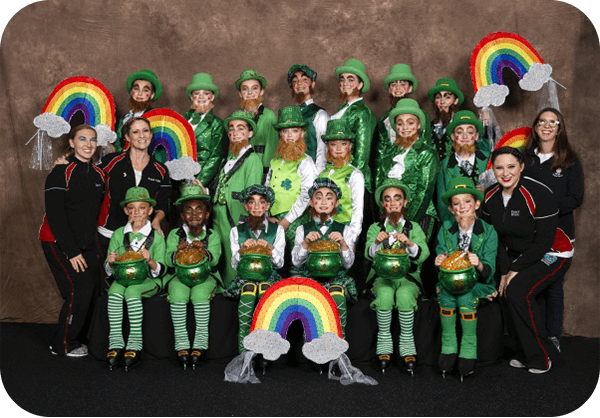 Figure skating group in St. Patricks Day green costumes
